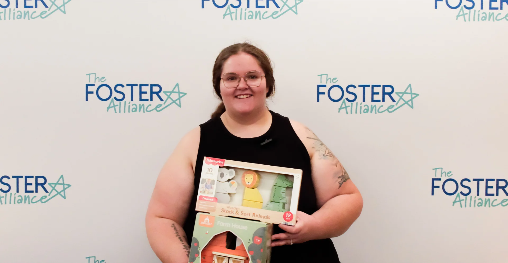 Foster parent Haylee smiling during a testimonial interview about her experience with The Foster Alliance.